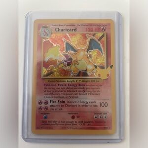 Charizard #4 - Pokémon Celebrations. Great condition and in a hard sleeve.